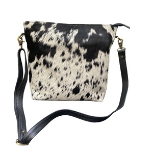 Bolso de hombro de cuero de vaca genuino de alta calidad, pelo blanco y negro, estilo bohemio con decoración de borlas, proveedor directo - Product Image 2