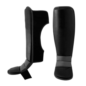 Protège-tibias de Muay Thai professionnels, respirants et ajustables, en cuir, avec logo personnalisé, pour le kickboxing, protection des jambes, vente en gros, haute densité - Product Image 1