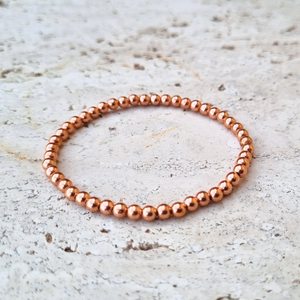 Bracelet en cuivre pur fait à la main, perles rondes élastiques, artisanat en métal et cuivre, bijoux minimalistes pour femmes - Product Image 4