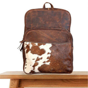 Export Quality Cowhide Leather Hair <b>Backpacks</b> Wholesale OEM Supplier Custom Logo Premium Lightweight Sports Outdoor 30-<b>40L</b> - Product Image 1