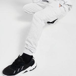 ผู้ผลิต OEM ขายส่ง กางเกงวอร์มสีเทาแบบมีเชือกผูก เอวสม็อค น้ำหนักเบา สวมใส่สบาย ผ้าฝ้าย สำหรับออกกำลังกาย เล่นกีฬา ผู้ชาย สั่งทำได้ - Product Image 5