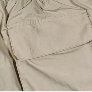 Sac cargo en toile de coton tricoté, style baggy, personnalisé, respirant, avec fermeture à cordon et multiples poches frontales, vente en gros - Product Image 6