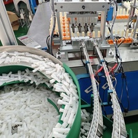 Machine d'assemblage de baume à lèvres QFW, capacité 3600 pièces/h, haute efficacité, machine à gloss à lèvres, machine à rouge à lèvres, ligne de production, ligne de fabrication