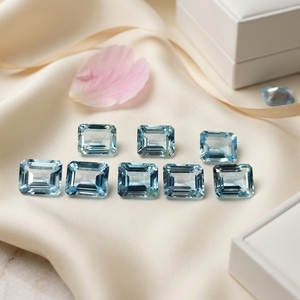 พลอยโทแพซสีฟ้าสดใสทรงแปดเหลี่ยมเจียระไนแบบ Step Cut - ขนาดปรับเทียบ 4x6 มม. พลอยโทแพซเจียระไนแบบหลวม ราคาขายส่งสำหรับแหวนและจี้ - Product Image 1