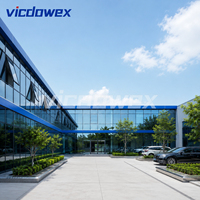 VICDOWEX Maison préfabriquée de luxe intégrée en forme de T avec fenêtres en aluminium pour usage commercial et bureautique contemporain