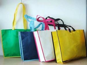 Bolsa de regalo plegable reutilizable no tejida con logotipo impreso personalizado, bolsa de asas de promoción colorida con asa de cuerda - Product Image 6