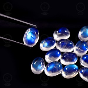 ANAM EMPORIUM Piedra lunar arcoíris de fuego azul natural, cabujón de forma ovalada, piedras preciosas sueltas de 7*5 mm, certificadas por terceros, 1 quilate - Product Image 1