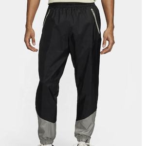 Mens Lightweight Water Resistant Windbreaker Pants Athletic Running <b>Joggers</b> With Zipper Pockets OEM Wholesale - Product Image 1