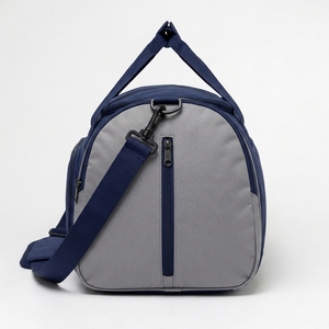 Bolsa de lona de alta calidad diseñada con tela ligera, compartimentos espaciosos, costuras resistentes y opción de transporte cómoda. - Product Image 3