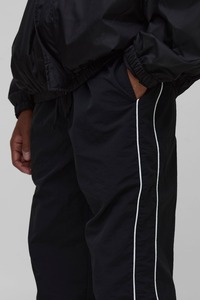 Pantalones de lona ligeros, holgados, de pierna ancha, personalizados, informales, para hombre, lavados, cortavientos, con bordado y cordón ajustable. - Product Image 2