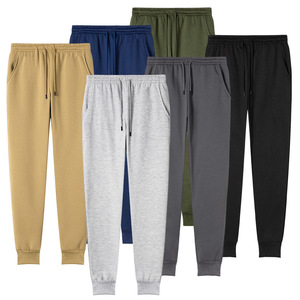Pantalones deportivos para hombre al por mayor, diseño y logotipo personalizados, color sólido, con cordón ajustable, pantalones de felpa gruesos y cálidos, joggers. - Product Image 1