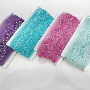 Tissu en dentelle perlée écologique de luxe avec broderie française et motif géométrique pour robes de mariée et tenues de soirée - Product Image 1