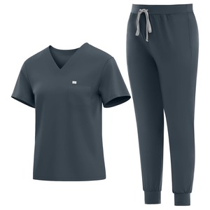 Conjunto de uniforme médico para mujer, top con cuello en V y pantalones con cordón, tela de punto de algodón y poliéster azul. - Product Image 1