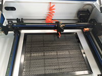 Machine de découpe et de gravure laser CO2 CNC à refroidissement par air à tube métallique pour cuir et bois