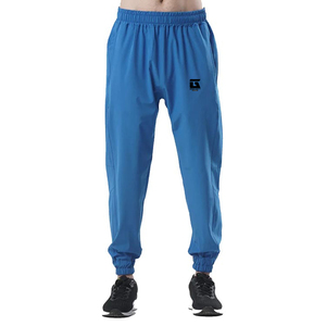 Pantalon cargo ample en molleton de polyester et coton pour homme, confortable et léger, avec design durable et finition délavée - Product Image 1