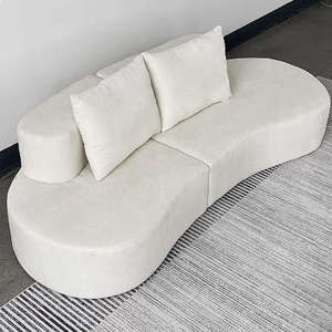 Sofá Seccional Curvo Moderno con Cojines - Product Image 1