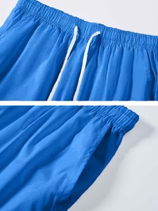 Ensemble veste coupe-vent à capuche bleue unisexe avec short, fermeture éclair résistante à l'eau, taille élastique, toutes saisons, coupe régulière, toutes tailles - Product Image 4