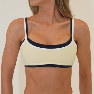 Soutien-gorge de sport pour femme, crème et bleu marine, à bretelles spaghetti, col rond, avec bordure contrastante, sans couture, respirant, maintien moyen - Product Image 1