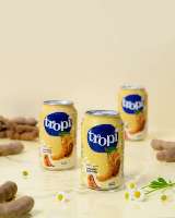 Boisson Tropi Juice 330ml en canette en aluminium 100% purée faible en gras saveur pastèque et fruits multiples jus frais pressé