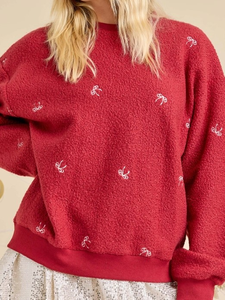 เสื้อสเวตเชิ้ตผู้หญิงปักลายโบว์ แขนยาว คอวี ผ้าพลัฌ สำหรับฤดูใบไม้ร่วง/ฤดูหนาว รับผลิตตามแบบ พร้อมขายส่ง - Product Image 4