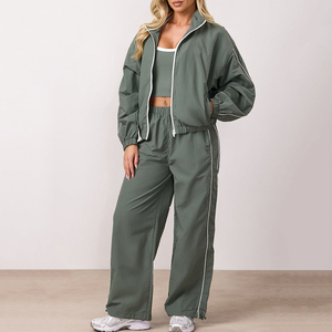 Survêtement pour femmes, couleur unie, coupe ample, veste et pantalon à fermeture éclair sur toute la longueur, ensemble respirant en Polyester, vêtements de printemps - Product Image 1