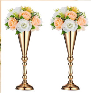 Stately engraved <b>gold</b> metal flower <b>vases</b> featuring ornate patterns on a raised base, pair, available at wholesale prices. - Product Image 3