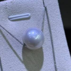 Collier polyvalent Kroos avec pendentif cœur étoilé et perle d'eau douce naturelle de 5 à 8 mm à haute brillance - Product Image 1