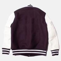 Blouson universitaire homme en PU bleu marine avec manches, col rabattable, fermeture boutonnée recouverte, style preppy, pour l'automne, logo frontal