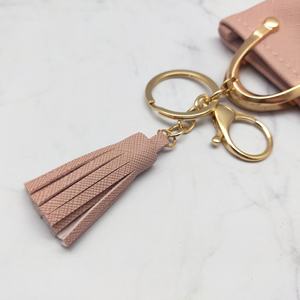 Charmant et mignon mini sac porte-clés en cuir PU et alliage de zinc avec décorations en pompons, pour femmes et filles, usage quotidien, tendance - Product Image 3