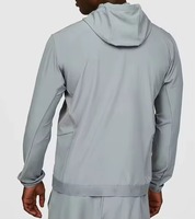 Vente en gros usine – Nouvelle veste coupe-vent unie à capuche pour homme, style streetwear d'été, en nylon, respirante et légère, grandes tailles