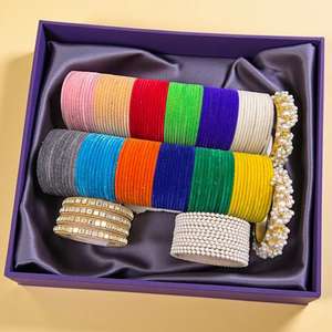 Brazaletes nupciales personalizados de hilo de seda con los nombres de los novios en letras doradas y un intrincado trabajo de piedras. - Product Image 3