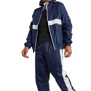 Conjunto deportivo reflectante de nailon con cremallera, resistente al viento, para correr en verano, chaqueta con cremallera y pantalones. - Product Image 1