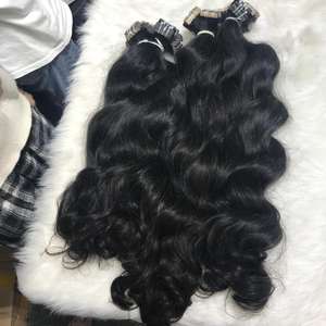 Extensiones de cabello ondulado con cinta natural, cabello humano vietnamita de 10-32 pulgadas con cinta de sensación de mano suave en extensiones - Product Image 1