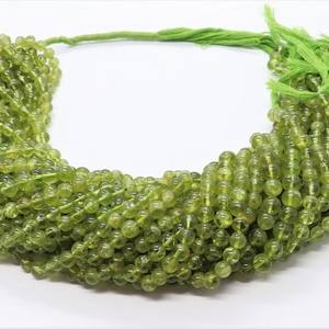 Cuentas redondas de peridoto natural liso AAA de 5-6 mm, bolas de peridoto lisas, hilo de 13 pulgadas, cuentas de peridoto verde para la fabricación de joyas. - Product Image 1