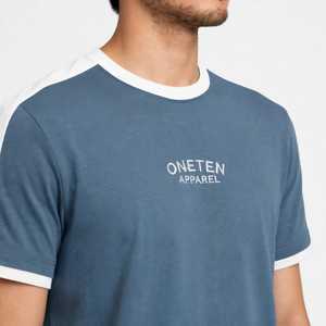 เสื้อยืดคอกลมผู้ชาย ONETEN สีน้ำเงิน ลายบล็อกสี โลโก้ด้านหน้า แขนสั้นลำลอง ผ้าฝ้าย 100% ระบายอากาศได้ดี เหมาะสำหรับฤดูใบไม้ร่วง - Product Image 5