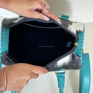 Bolso de lujo de cuero vacuno premium con asa trenzada y correa cruzada de cuero. - Product Image 6