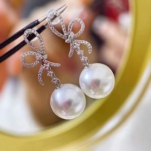 Manufacturer Wholesale S925 Pure Silver Dangle Earrings with Natural Pearl 10-9MM Round Face Flawless <b>Matching</b> Gift <b>Box</b> - Product Image 1
