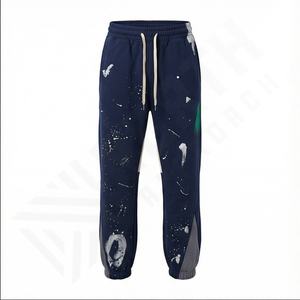Mode peinture éclaboussures Flare pantalon personnalisé lettre impression bord brut survêtement pantalon Patchwork Graffiti élastique Flare pantalons de survêtement - Product Image 2