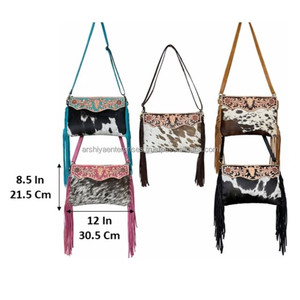 Latest OEM ODM Hand Tooled Genuine Cowhide Leather Fringe Bag Hair On hide Floral & Bull Pattern Designer Piece for Women's - Product Image 2