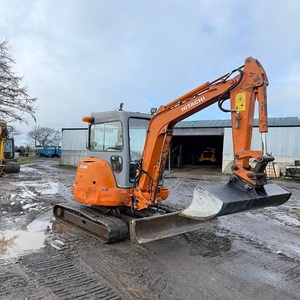 Mini-excavatrice Hitachi moderne, adaptée aux travaux de drainage, à l'installation de canalisations et aux tâches d'excavation quotidiennes pour les travaux lourds. - Product Image 1