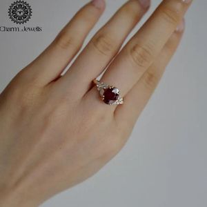 Bague de fiançailles classique en moissanite plaqué or 18 carats pour femme, taille coussin, sertie à griffes, certifiée IGI, par Charm Jewells - Product Image 1