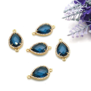 Componente de Joyería: Colgante Conector con Engaste de Oro y Circonitas Cúbicas Pavé, con Topacio Azul Suizo en Forma de Pera de 10x12mm y Doble Anilla - Product Image 4