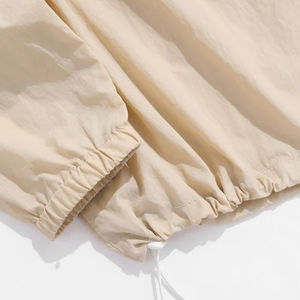 ชุดเซ็ตวินด์เบรกเกอร์ผู้ชายคุณภาพสูงแบบสั่งทำพิเศษ ทรงหลวม ระบายอากาศได้ดี ชุดวอร์มไนลอนสีพื้นสำหรับฤดูร้อน - Product Image 6