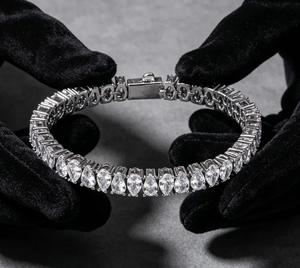 Pulsera de tenis de moissanita en tono plateado con piedra en forma de pera y cierre de broche, joyería de moda, regalo - Product Image 1