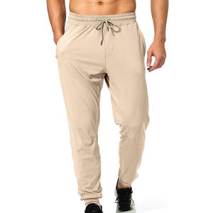 Pantalones de entrenamiento de fútbol especializados con aberturas en las piernas con cremallera para facilitar la extracción sobre los zapatos durante el calentamiento y enfriamiento previo al partido. - Product Image 6