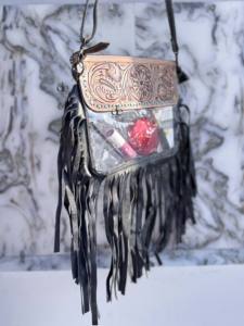 กระเป๋าหนังแท้ลายแกะสลักด้วยมือ รุ่นใหม่ล่าสุด ปี 2026 พร้อมพู่หนัง ดีไซน์โปร่งใสทันสมัย ใช้งานได้หลากหลาย เหมาะสำหรับผู้หญิง - Product Image 2