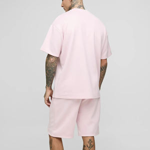 Conjunto de camiseta y pantalones cortos de algodón rosa para hombre, con cuello redondo, informal, para verano, con estampado de letras y logotipo en la parte delantera, de tela tejida. - Product Image 4