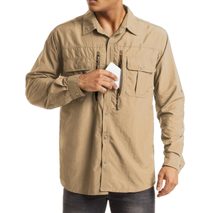 Camisa de trabajo premium con botones que ofrece comodidad suave, tela duradera y estilo profesional para diversas actividades en el lugar de trabajo. - Product Image 1