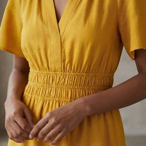 Yellow Cotton Flax <b>Elasticated</b> Short Tier <b>Dress</b> For Women Featuring Lightweight Fabric Modern Style Comfortable Fit For Everyday - Product Image 6