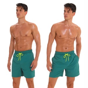 Shorts de bain vert uni pour homme Crown Gate International, taille mi-haute avec cordon de serrage, respirant, séchage rapide, décontracté, coupe classique, idéal pour l'été - Product Image 3